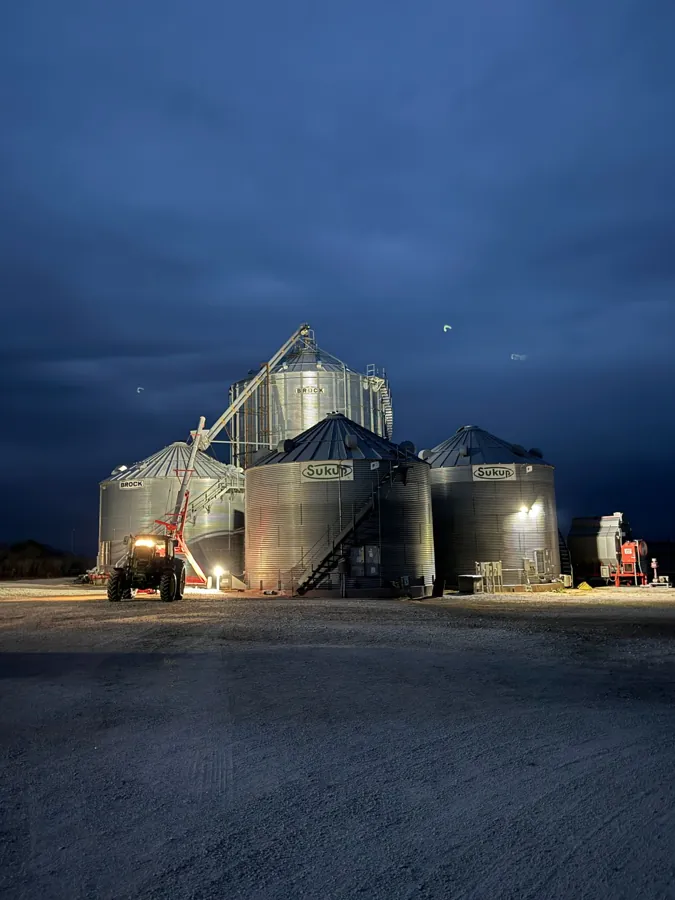 Grain bins at dusk